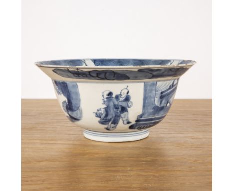 Blue and white bowlChinese, Kangxi periodpainted with a monk to the centre and further figures around the side, with a painte