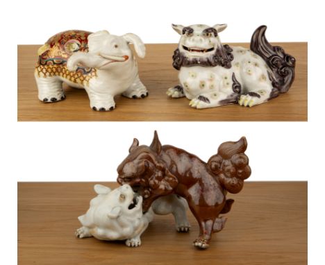 Three porcelain models of animalsJapanese, 19th Centuryto include two fighting kylins, 25cm, model of an elephant, 17cm long 