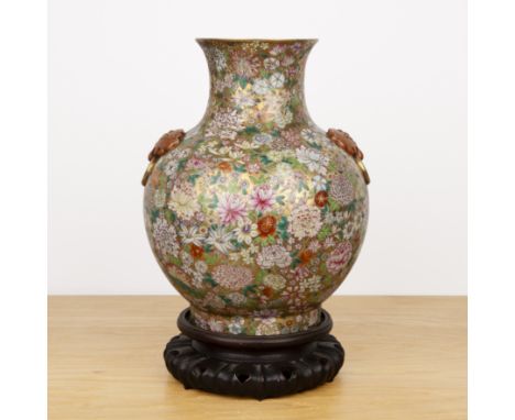 Millefleur porcelain vase and standChinese, circa 1900with raised ruyi and ring handles. The enamel decoration on a gold grou