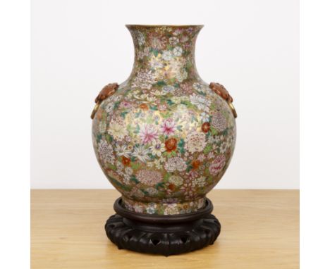 Millefleur porcelain vase and standChinese, circa 1900with raised ruyi and ring handles. The enamel decoration on a gold grou