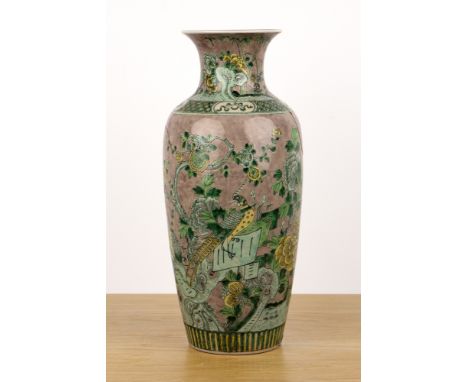 Famille verte vaseChinese, Kangxipainted with rockwork and flowers and with a biscuit glaze mouth rim, four character Kangxi 