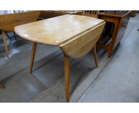 An Ercol Blonde elm and beech Windsor drop-leaf table 