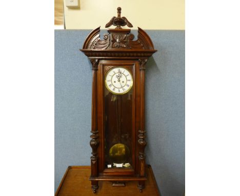 A 19th Century walnut double weight Vienna wall clock 