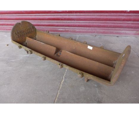 A cast iron feeding trough by T. Richardson &amp; Sons 