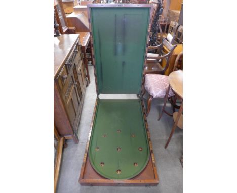 A Victorian mahogany folding bagatelle board 