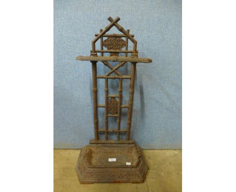 A Victorian Aesthetic Movement cast iron stick stand 