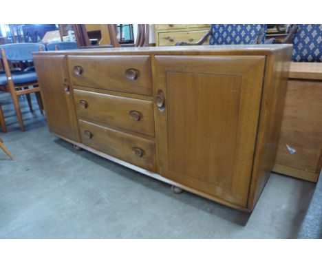 An Ercol Blonde elm Windsor sideboard 