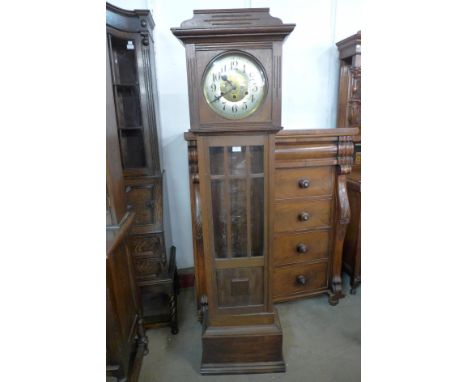 An early 20th Century oak longcase clock, 183cms h 