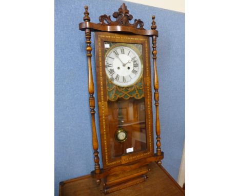 A 19th Century inlaid walnut Vienna wall clock 