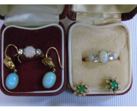 An opal cluster ring plus one 18ct gold ring set with opal and two diamonds, opal earrings and another pair of earrings.