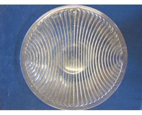 A Rene Lalique dish marked R. Lalique France to the centre with a geometric pattern.  Dia. approx 11"