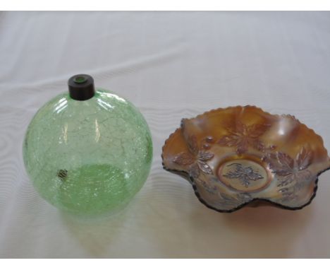 A crackleware glass lamp base and a carnival glass dish.