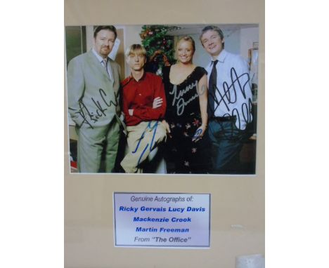 A signed photographic print of the male cast from 'The Office' TV series signed by Ricky Gervais, Mackenzie Crook, Martin Fre