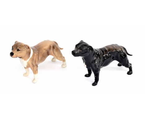 Two Beswick Staffordshire bull terriers, model 3060 in brindle and light tan, each 4.5" high (2)