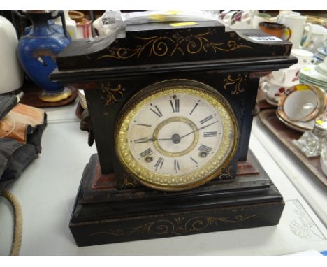 A slate mantel clock (distressed)
