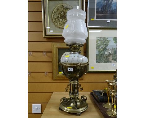 A brass aesthetic-style oil lamp with mottle glass reservoir & etched glass shade
