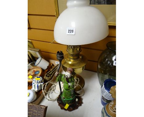 A ceramic Chinese mandarin table lamp together with brass oil lamp