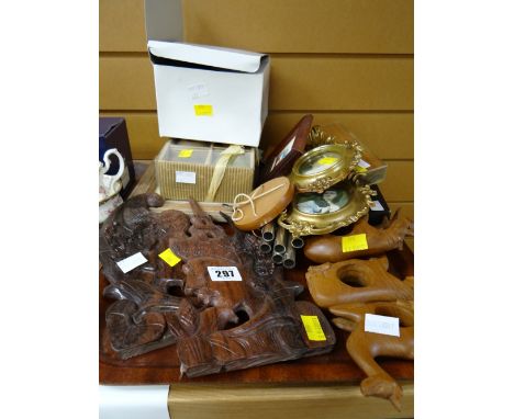 A parcel of carved ornaments, miniature portrait prints etc