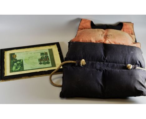 A mid / early twentieth century maritime life jacket printed with 'Victory Fosco' together with a print relating to Dunkirk
