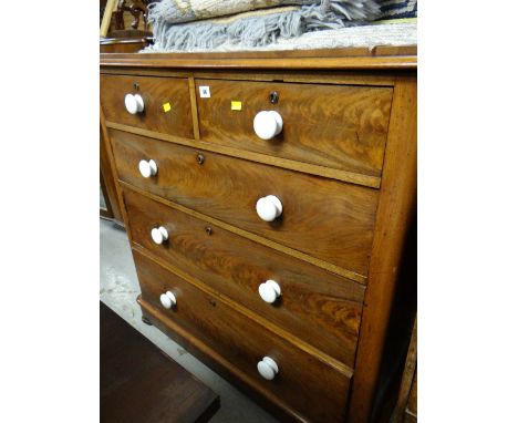 A Victorian mahogany chest of three long & two short drawers with ceramic knobs