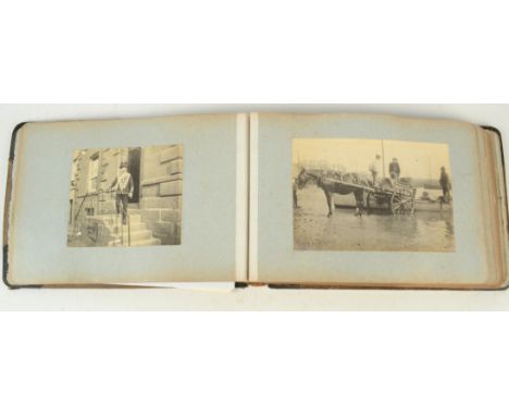 A hardback photograph album 19 x 28cm, relating to the previous lot, containing many enlargements from that album. 34 photos,