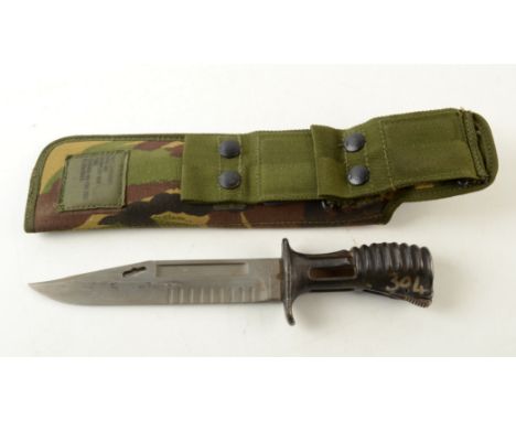 A military frog bayonet, in khaki scabbard, length 28cm. 