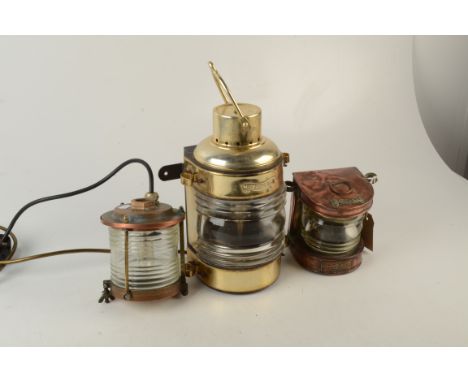 A copper masthead ships lamp, by Simpson Lawrence Ltd Glasgow, height 14cm, width 16.5cm, depth 12cm, a reproduction brass ma