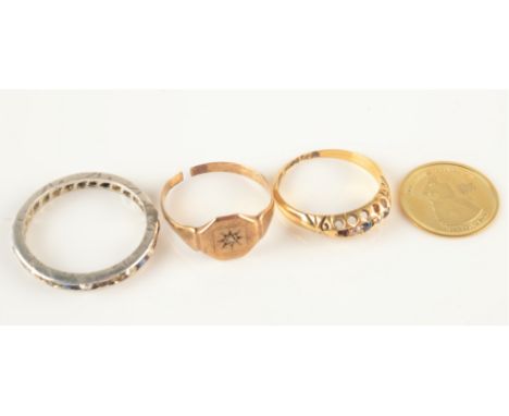 Two gold rings, one other ring and a gold Half Crown 1g in plastic capsule. Condition report: One 18 ct ring 1.9gms. Other ri