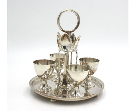 A Goldsmiths &amp; Silversmiths Co Ltd silver egg cruet set, London 1928/9, 15.7oz. Condition report: Good overall condition,