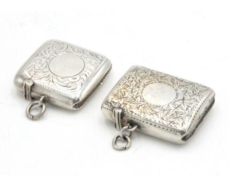 A curved silver vesta case with chased scrolling decoration by William H Haseler, Birmingham 1915, together with one other cu
