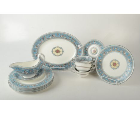 A Wedgwood bone china Florentine pattern part dinner service, comprising six cups saucers and side plates, a gravy boat and s