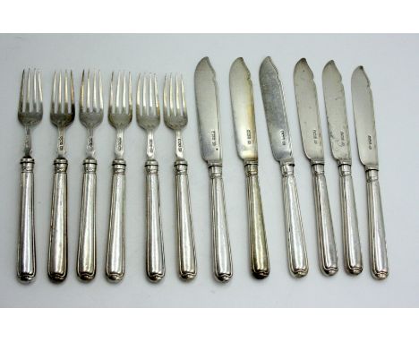 A set of six Harrison Brothers &amp; Howson silver bladed fish knives and forks with filled silver handles, Sheffield 1913.