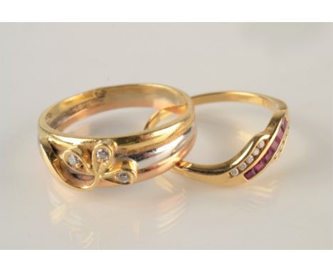 A contemporary 18ct yellow and white gold ring mounted with a diamond set clover leaf, together with one other 18ct gold ring