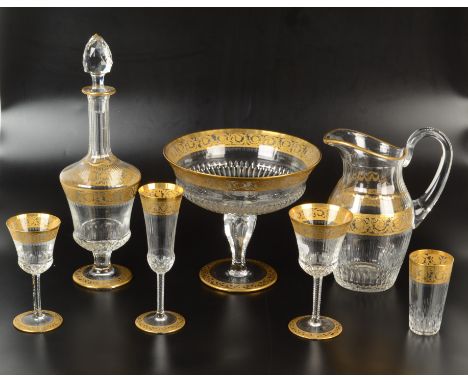 A valuable suite of fine St Louis glass, cut and with gilt etched borders to the rims and feet, comprising a decanter, a wate