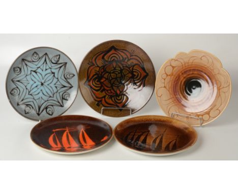 Three Poole shape 4 trays, a shape 4 shallow bowl and a shape 588 shaped rim shallow bowl
