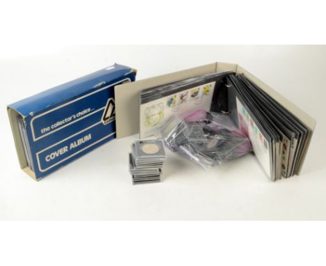 A collection of fifty one commemorative crowns, two books of first day covers and some mint stamps. 