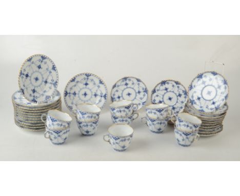 A Royal Copenhagen Onion pattern blue and white part tea service, comprising of eleven 14.5cm plates, ten cups and eleven sau
