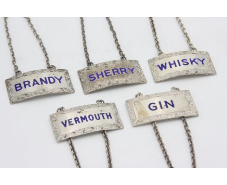 A set of five modern silver and enamel decanter labels for Gin, Brandy, Sherry, Whisky and Vermouth, each with cast border. 3