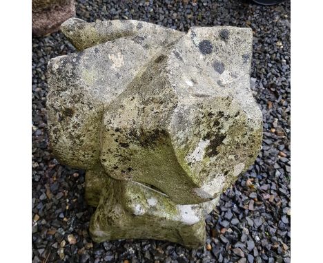 An abstract stone sculpture by David Wilkinson, weathered, height 35cm, depth 28cm, width 30cm. Condition report: Weathered a