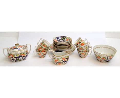 A Newhall pattern 1153 part tea service, comprising seven tea cups, five coffee cups, eight saucers and a sugar box and lid, 