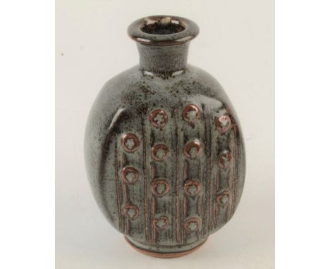 A John Leach studio pottery tenmoku glazed bottle vase, of rectangular section each face with stylised flower heads, height 1