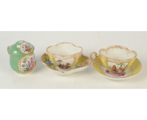 Three continental porcelain cups and two saucers.