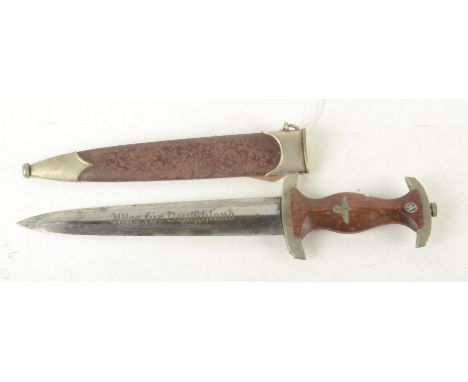 A WWII Third Reich dagger, 22cm blade with 'Alles fur Deutchsland' motto with indistinct Solingen makers mark, early nickel f