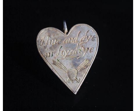 A Royalist heart shaped silver locket, one side engraved 'I morne for Monarchy' the other side 'I live and dye in loyaltye', 
