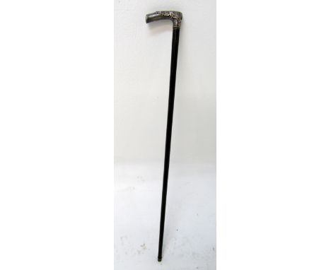 A Chinese silver handled walking stick, decorated with dragons, maker's mark tablet, height 86cm, length of handle 9.5cm.