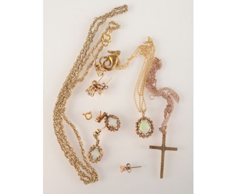 Gold chains, a 9ct. gold cross, a pair of gold mounted opal earrings, other gold earrings and a gold pendant.