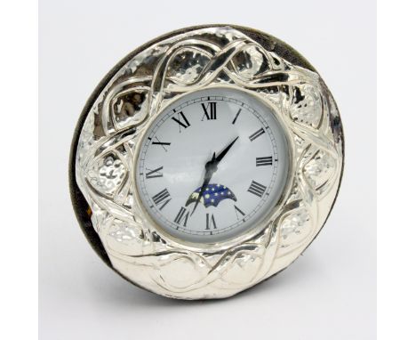 A silver mounted timepiece the dial with lunar arch.