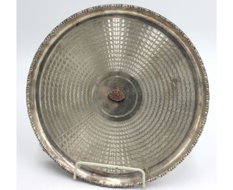 An engine turned silver plated RMS Mauritania tray, diameter 25.5cm.