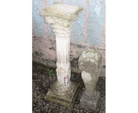 A reconstituted stone garden pillar with fluted column and figural base, height 73cm, width 24cm and a single stone balustrad