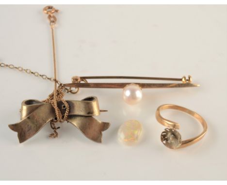 An unmounted opal, a fine gold chain, a pearl mounted gold bar brooch and two other pieces.